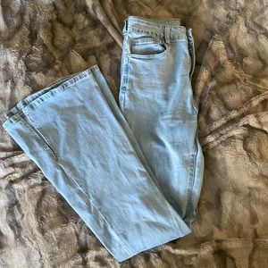 High waist flare jeans with leg slit